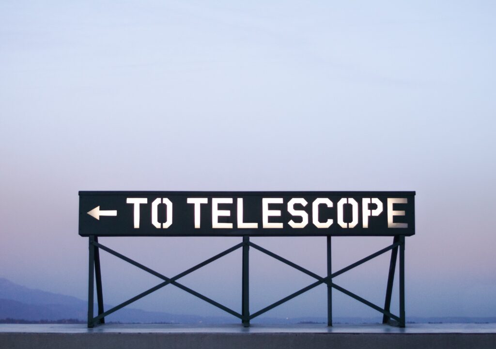 "TO TELESCOPE" SIGN, AT DAWN